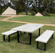 Concrete bench seat on steel frame